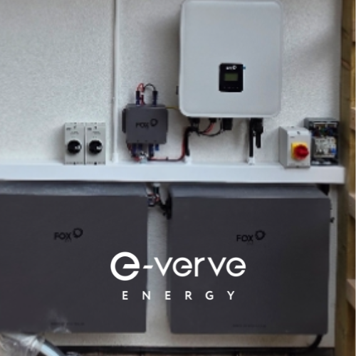 2 grey fox ess batteries installed by e-verve energy with solar inverter against white garage wall