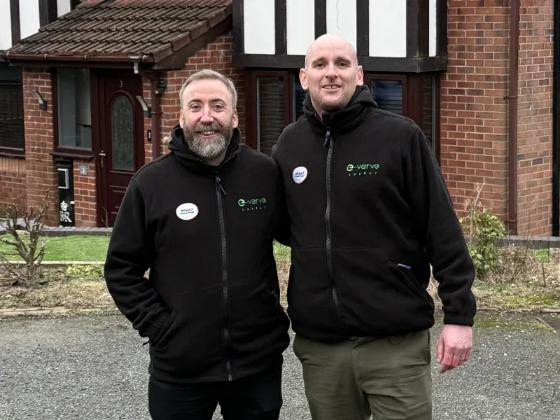 Two members of the E-Verve Energy team outside a recent North West install